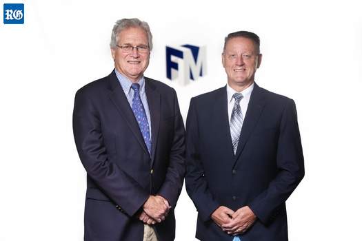 Michael Freisenbruch, left, FMIS president and chairman, with Andrew Wright, the company’s newly appointed CEO