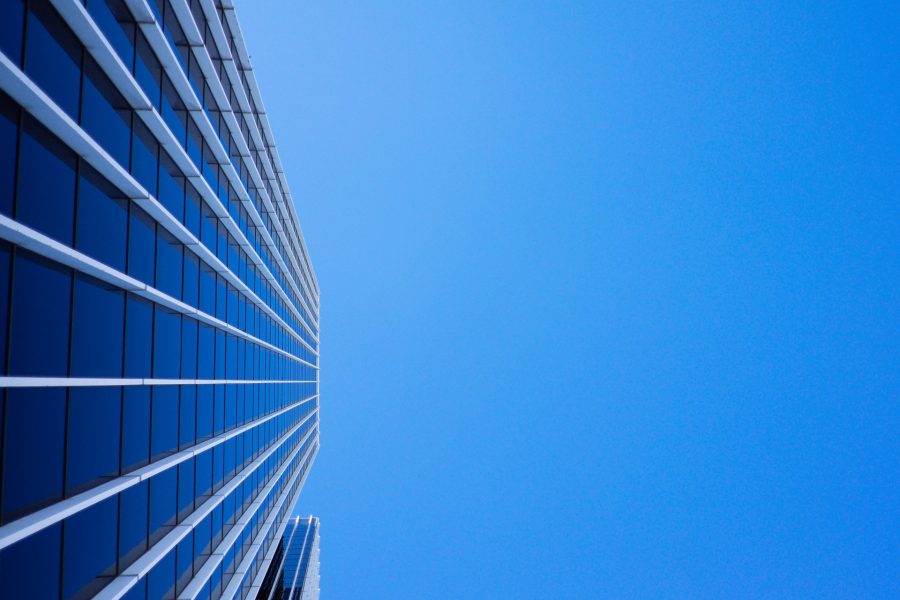 skyscraper against a royal blue sky