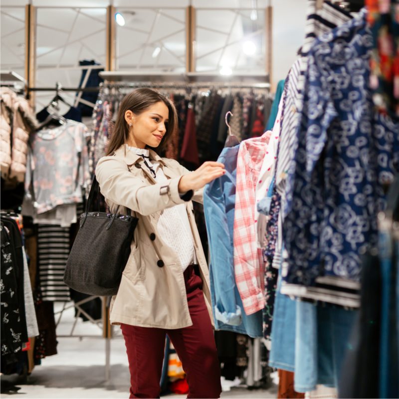 Beautiful woman shopping in a clothing store